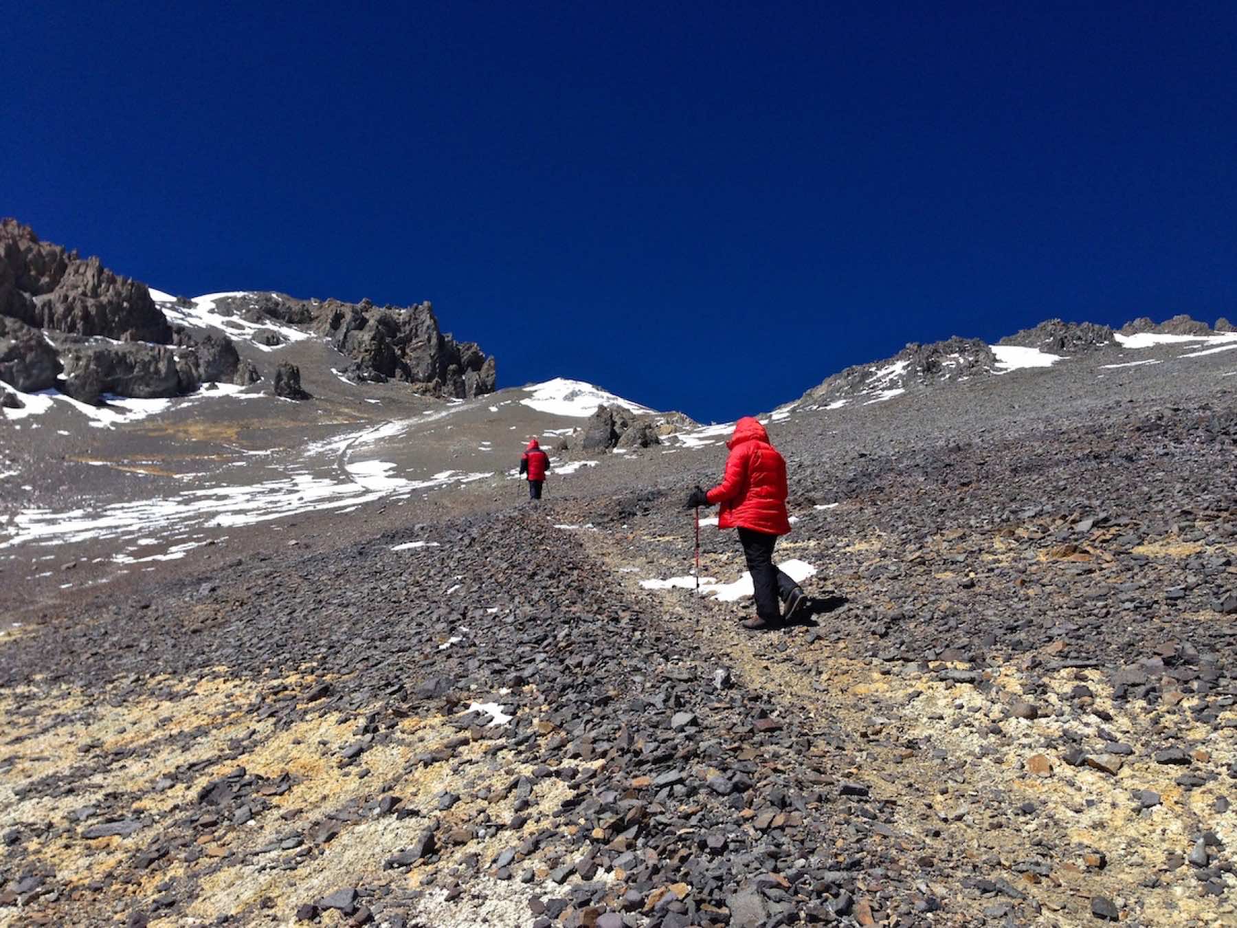 Climbers moving through Aconcagua mountain terrain
